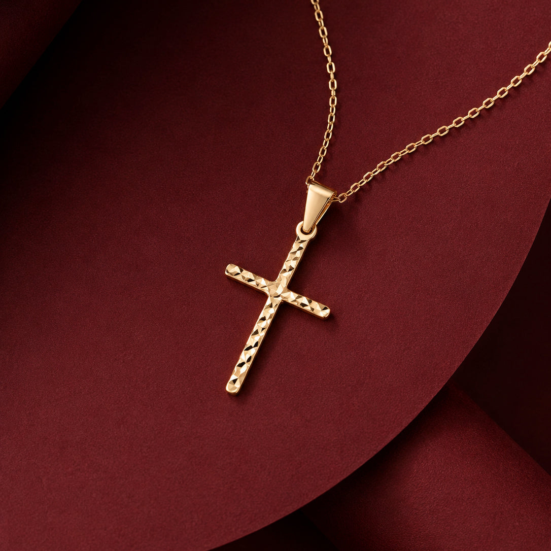 Diamond cut handcrafted cross necklace in 14K solid gold by Madano Jewels, perfect religious gift.