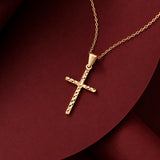 Diamond cut handcrafted cross necklace in 14K solid gold by Madano Jewels, perfect religious gift.