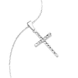 14K white gold cross pendant with intricate diamond-cut engraving design.