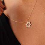 Elegant Star of David necklace crafted in 14K real solid yellow gold with sparkling diamond accents. A symbolic and stylish Judaica necklace, ideal for gifting or personal wear.
