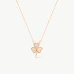 14K solid yellow gold shamrock pendant necklace featuring heart-shaped mother of pearl leaves and a diamond-accented stem. This elegant Saint Patrick’s clover symbolizes good luck and charm, perfect for everyday wear or as a special gift.
