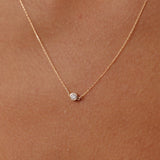 14K Real Solid Gold necklace with an F color solitaire diamond in a bezel setting, showcasing minimalist elegance and perfect for gifting or daily wear. Ideal for those who value understated luxury.