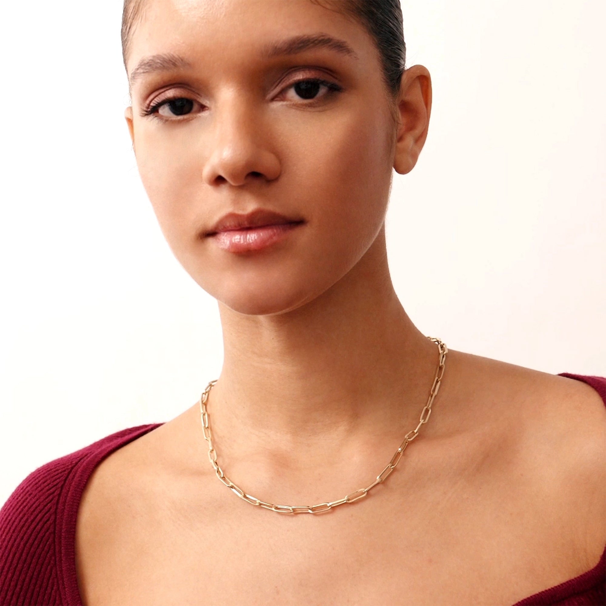 14K real solid gold heavy paperclip necklace with rectangular links, available in 14, 16, 18, and 20 inches, featuring a secure lobster clasp, perfect for layering or wearing alone as a bold statement accessory.