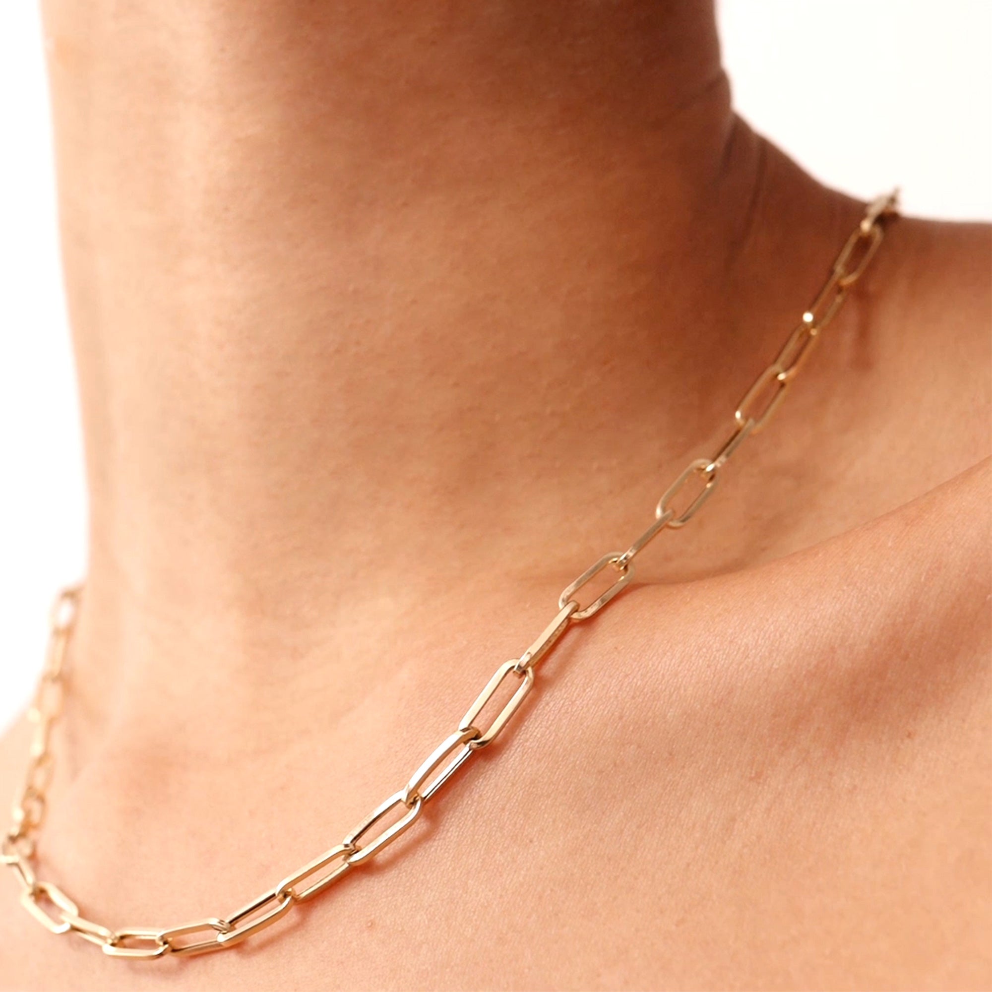 14K real solid gold heavy paperclip necklace with rectangular links, available in 14, 16, 18, and 20 inches, featuring a secure lobster clasp, perfect for layering or wearing alone as a bold statement accessory.