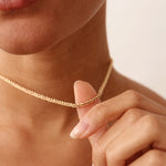 A 14K real solid gold thick rope chain necklace with a twisted design, featuring a lobster clasp closure, suitable for men and women, available in 14, 16, 18, and 20 inches, perfect for layering or as a standalone accessory.