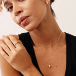 14K gold evil eye necklace with an opal centerpiece set in a geometric pendant, featuring an adjustable chain with 14, 16, 18, and 20-inch length options. Stylish and symbolic, perfect for protection and gifting.