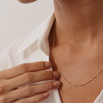 14K Real Solid Gold Figaro Chain Necklace with alternating short and elongated links, available in 14, 16, 18, and 20 inches; a classic and elegant piece suitable for layering or standalone wear, perfect as a gift.