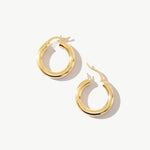 14K real solid yellow gold huggie hoop earrings with a minimalist design. These small, dainty hoops offer a sleek and elegant look, perfect for everyday wear or adding a subtle touch of sophistication to any outfit.