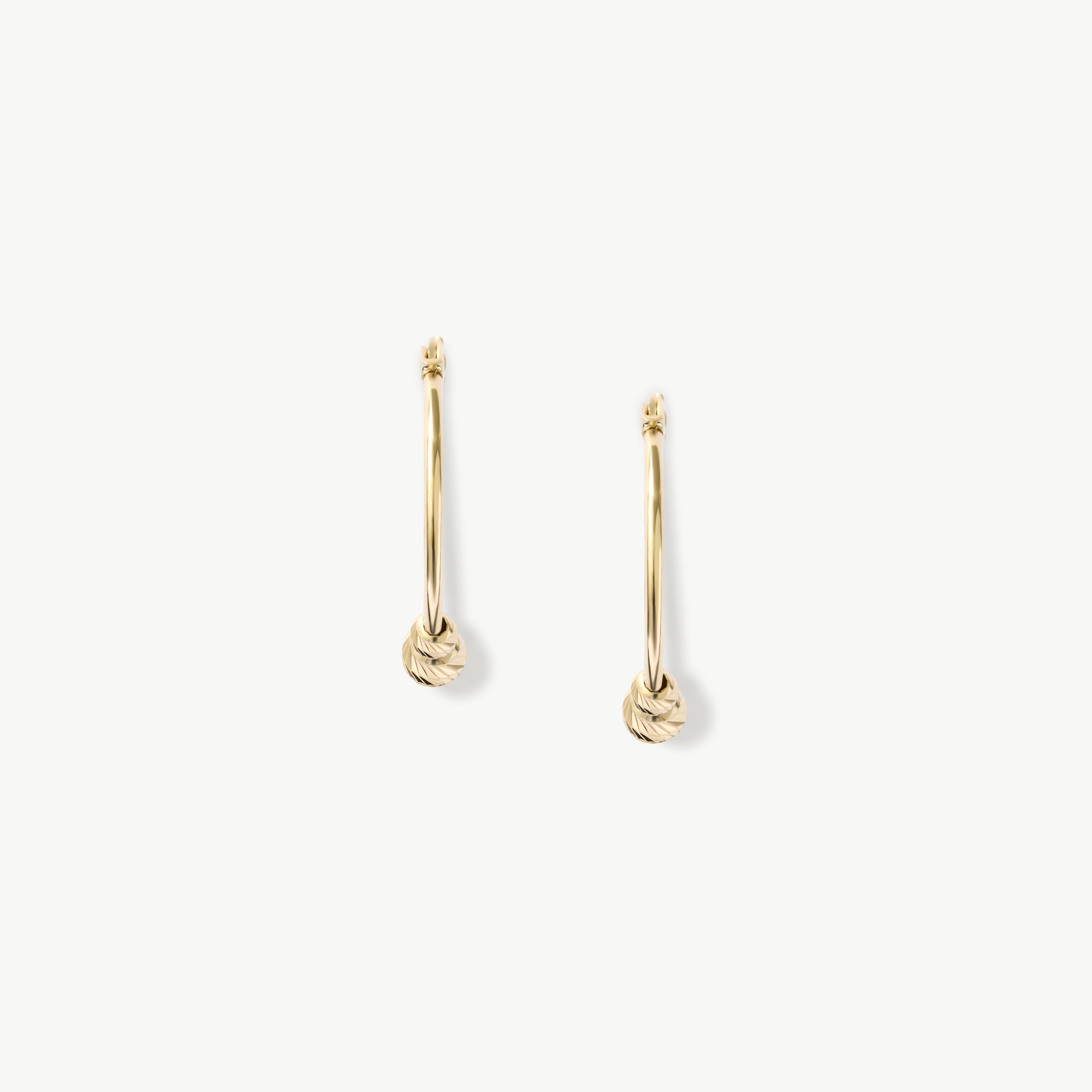 14K gold beaded hoop earrings with lever-back clasp, featuring delicate gold beads for added charm and elegance, perfect for both everyday wear and special occasions.