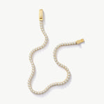 14K Real Solid Gold Cubic Zirconia Tennis Bracelet with a continuous line of cubic zirconia stones, perfect for adding sparkle to any outfit; ideal as a gift for birthdays, anniversaries, or special occasions.