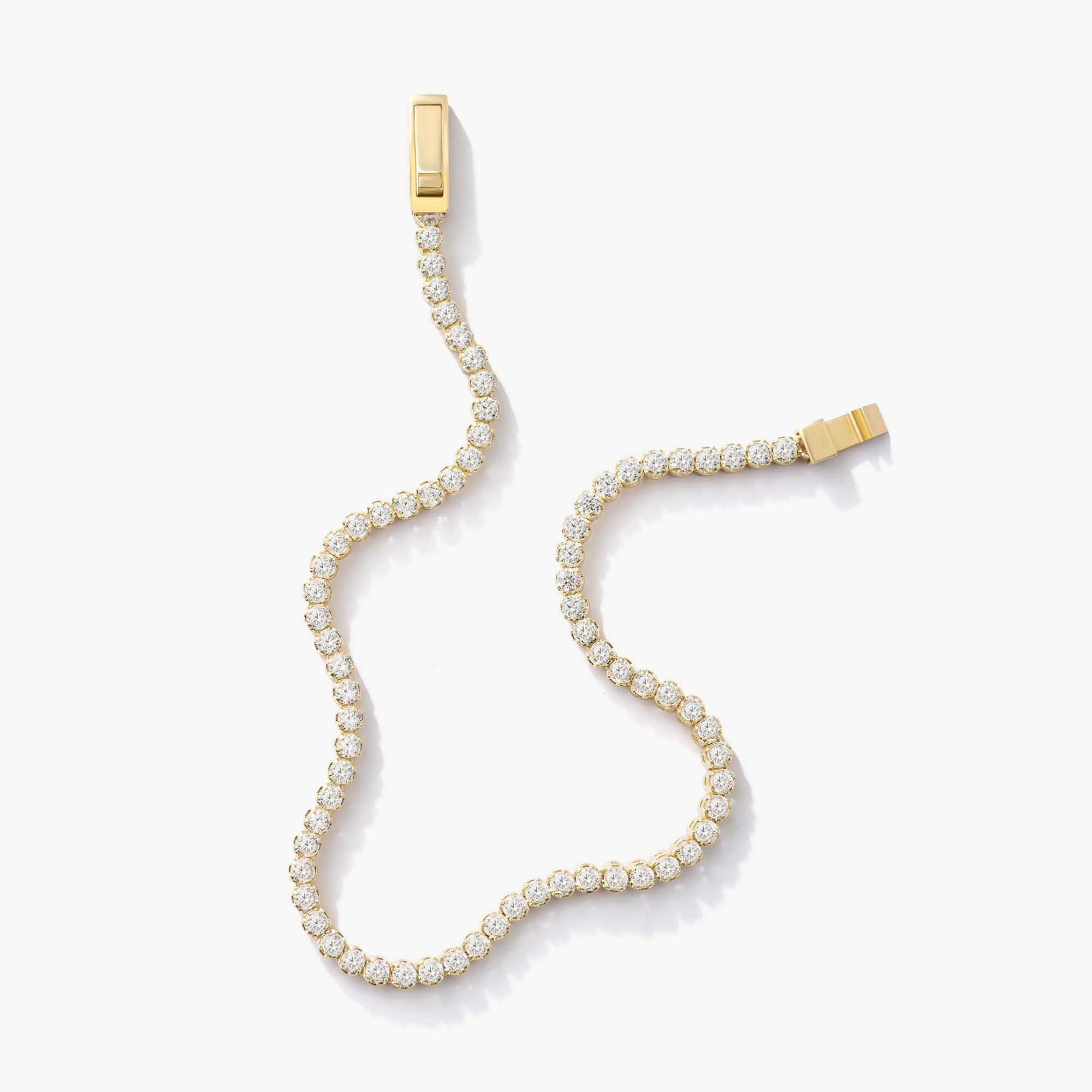 14K Real Solid Gold Cubic Zirconia Tennis Bracelet with a continuous line of cubic zirconia stones, perfect for adding sparkle to any outfit; ideal as a gift for birthdays, anniversaries, or special occasions.