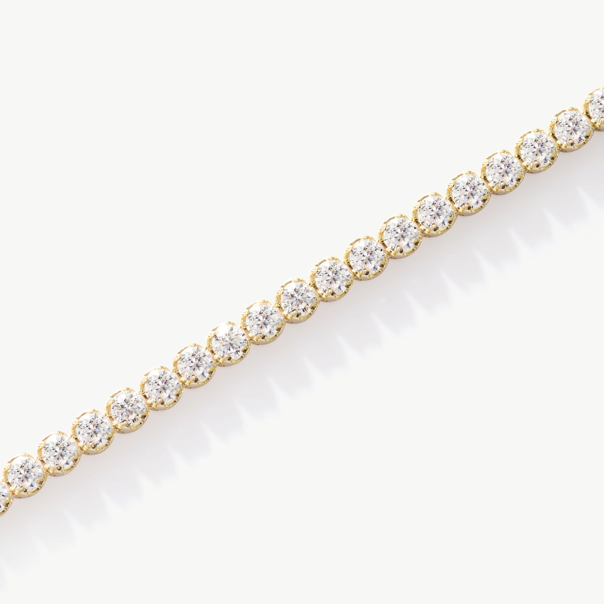 14K Real Solid Gold Cubic Zirconia Tennis Bracelet with a continuous line of cubic zirconia stones, perfect for adding sparkle to any outfit; ideal as a gift for birthdays, anniversaries, or special occasions.
