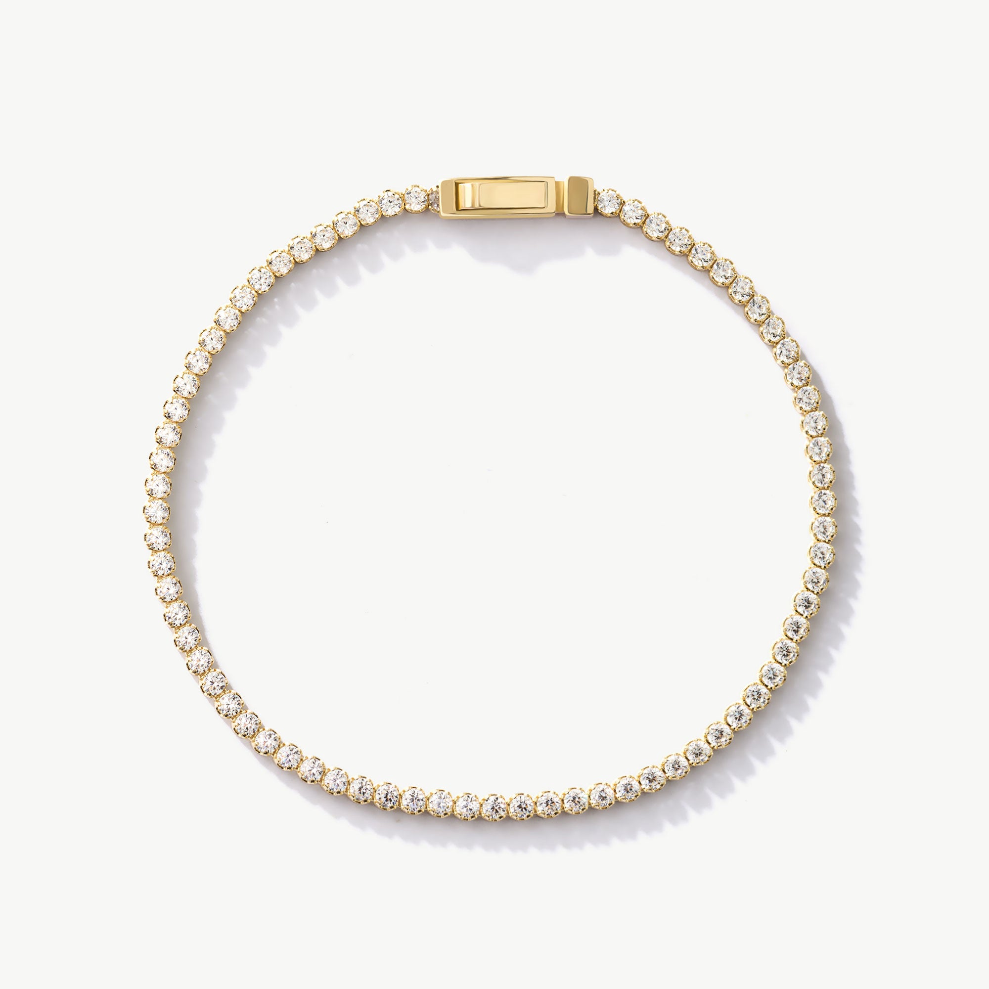 14K Real Solid Gold Cubic Zirconia Tennis Bracelet with a continuous line of cubic zirconia stones, perfect for adding sparkle to any outfit; ideal as a gift for birthdays, anniversaries, or special occasions.
