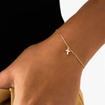 14K Real Solid Gold Cross Bracelet with F color diamonds, showcasing an elegant cross charm on a delicate gold chain, perfect for baptism gifts and religious occasions.