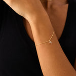 14K Real Solid Gold Cross Bracelet with F color diamonds, showcasing an elegant cross charm on a delicate gold chain, perfect for baptism gifts and religious occasions.