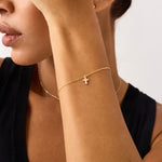 14K Real Solid Gold Cross Bracelet with F color diamonds, showcasing an elegant cross charm on a delicate gold chain, perfect for baptism gifts and religious occasions.