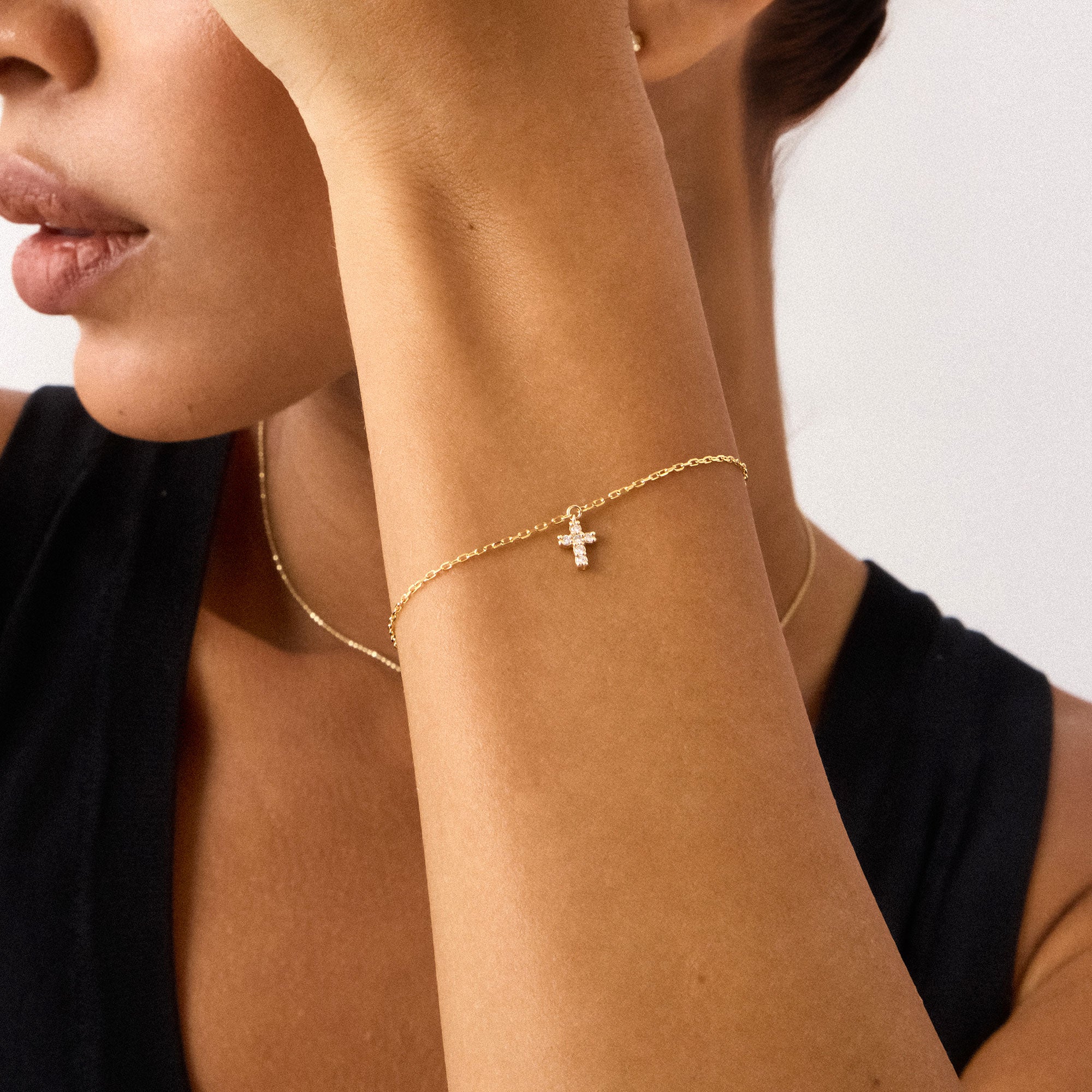 14K Real Solid Gold Cross Bracelet with F color diamonds, showcasing an elegant cross charm on a delicate gold chain, perfect for baptism gifts and religious occasions.