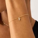 14K Real Solid Gold Cross Bracelet with F color diamonds, showcasing an elegant cross charm on a delicate gold chain, perfect for baptism gifts and religious occasions.