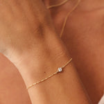 14K Real Solid Gold F Color Diamond Solitaire Beaded Bracelet with a bezel-set design, perfect for women, shown with an elegant chain and secure spring ring clasp.