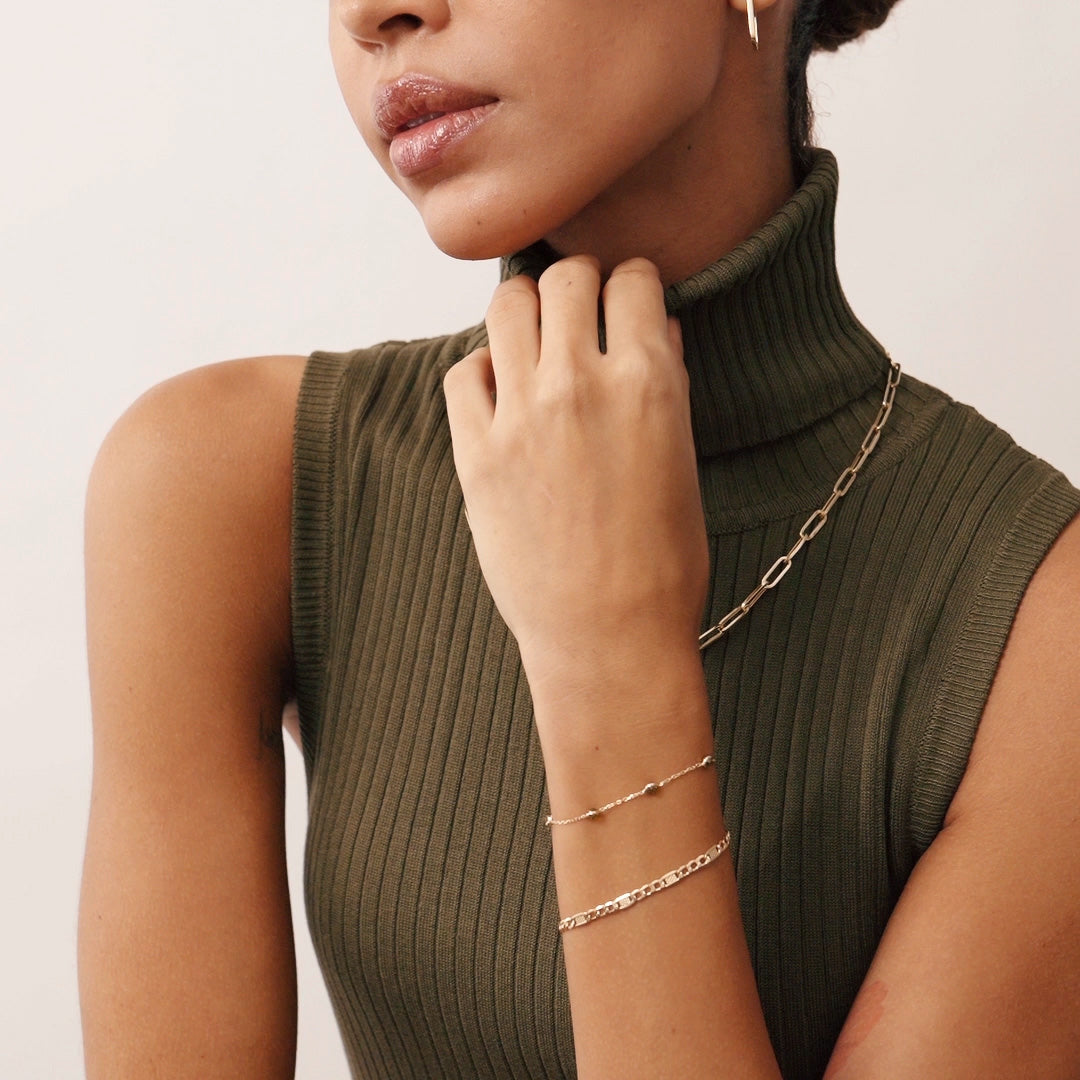 14K Real Solid Gold Unique Figaro Bracelet with intricately detailed links and a secure spring ring clasp, perfect for both men and women
