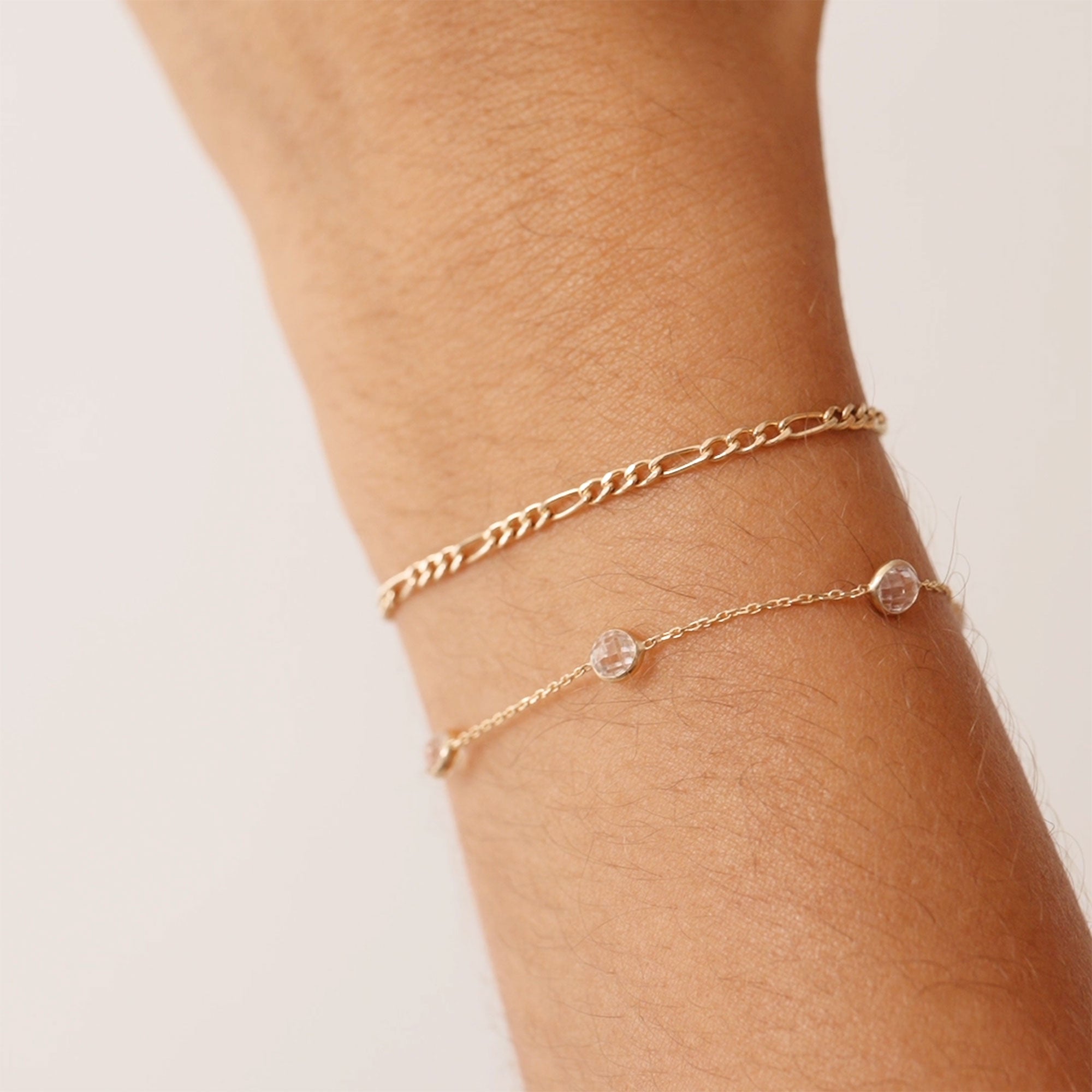 14K Real Solid Gold Figaro Bracelet featuring classic Figaro link chain design, suitable for men and women; perfect as a luxurious gift for special occasions like Christmas and anniversaries.