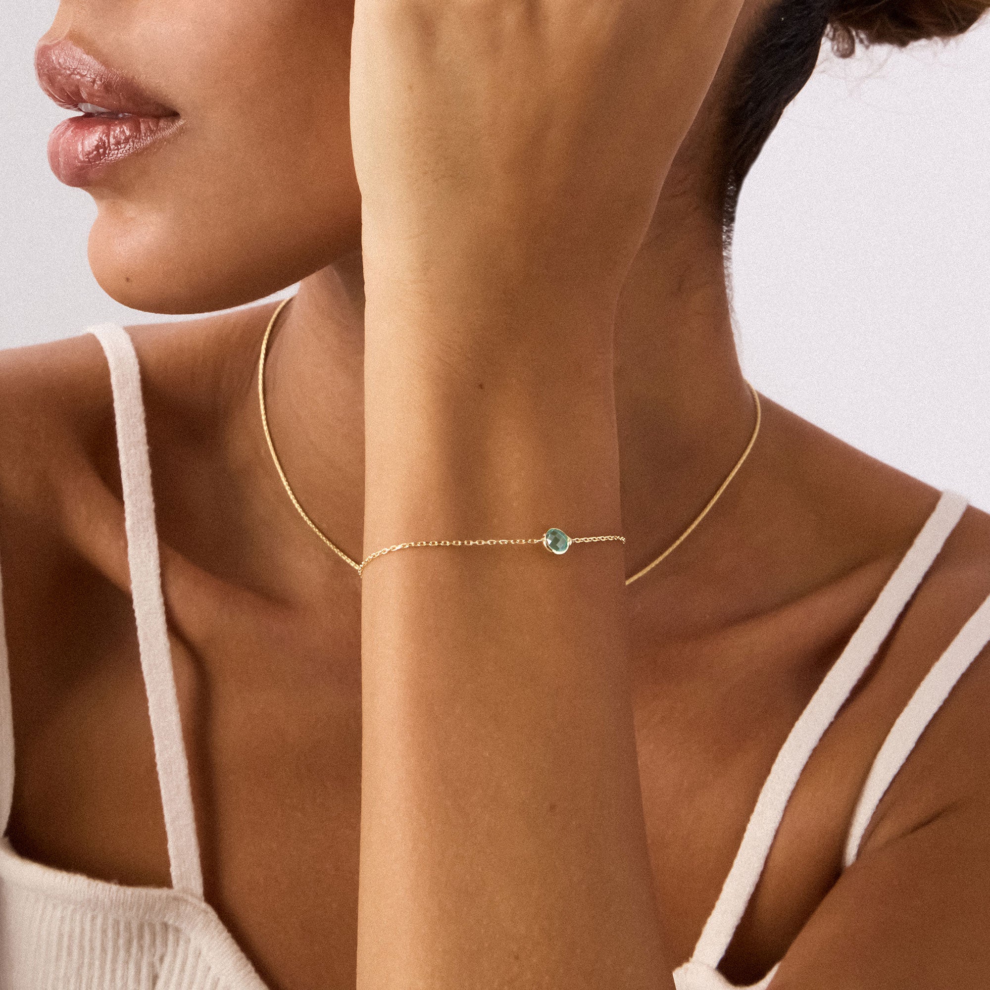 14K Real Solid Gold Aquamarine Birthstone Bracelet featuring a dainty aquamarine crystal centerpiece on an adjustable gold chain, perfect as a March birthstone gift.