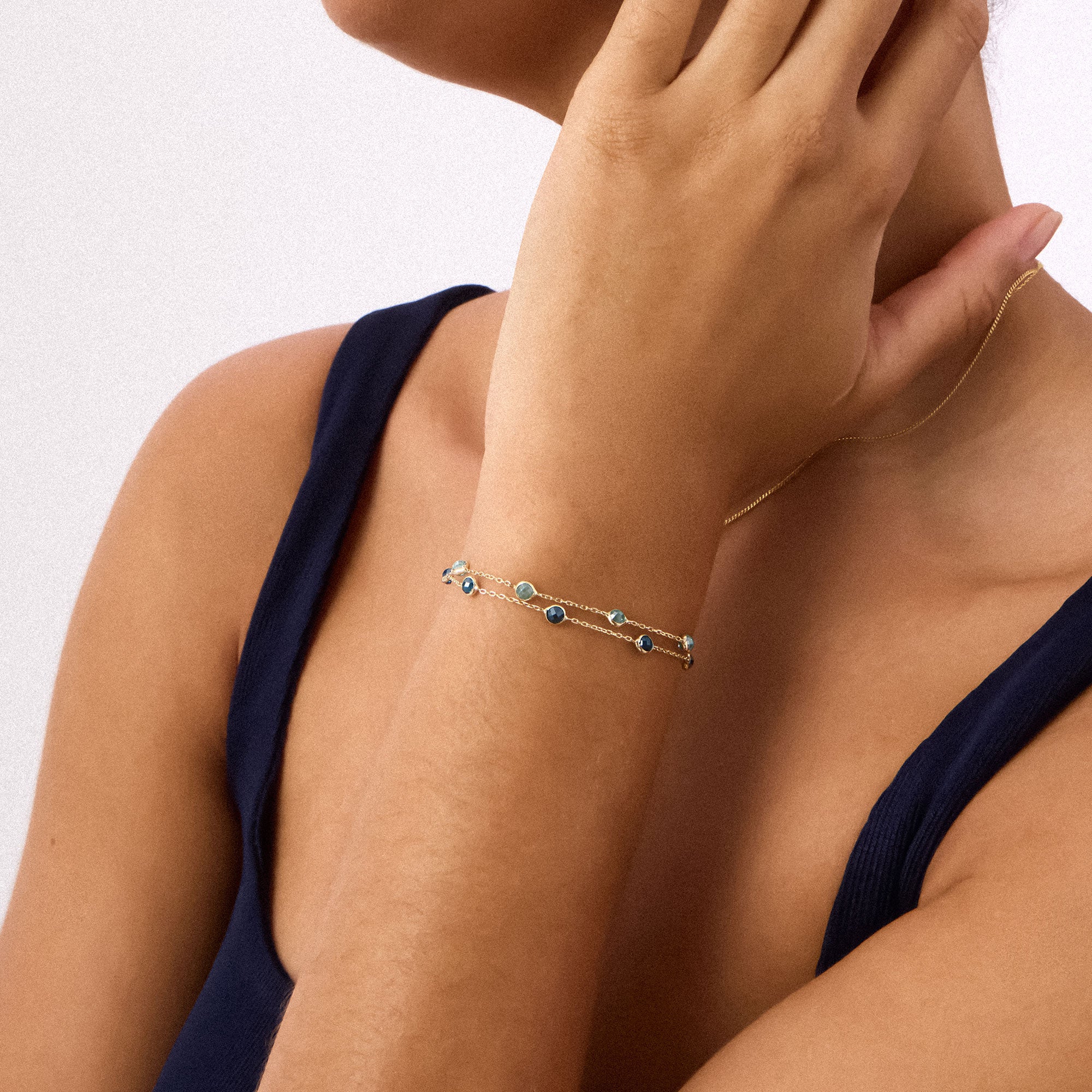 14K gold bracelet featuring beaded aquamarine stones, showcasing an elegant and timeless design, perfect for March birthstone jewelry and gifting occasions.