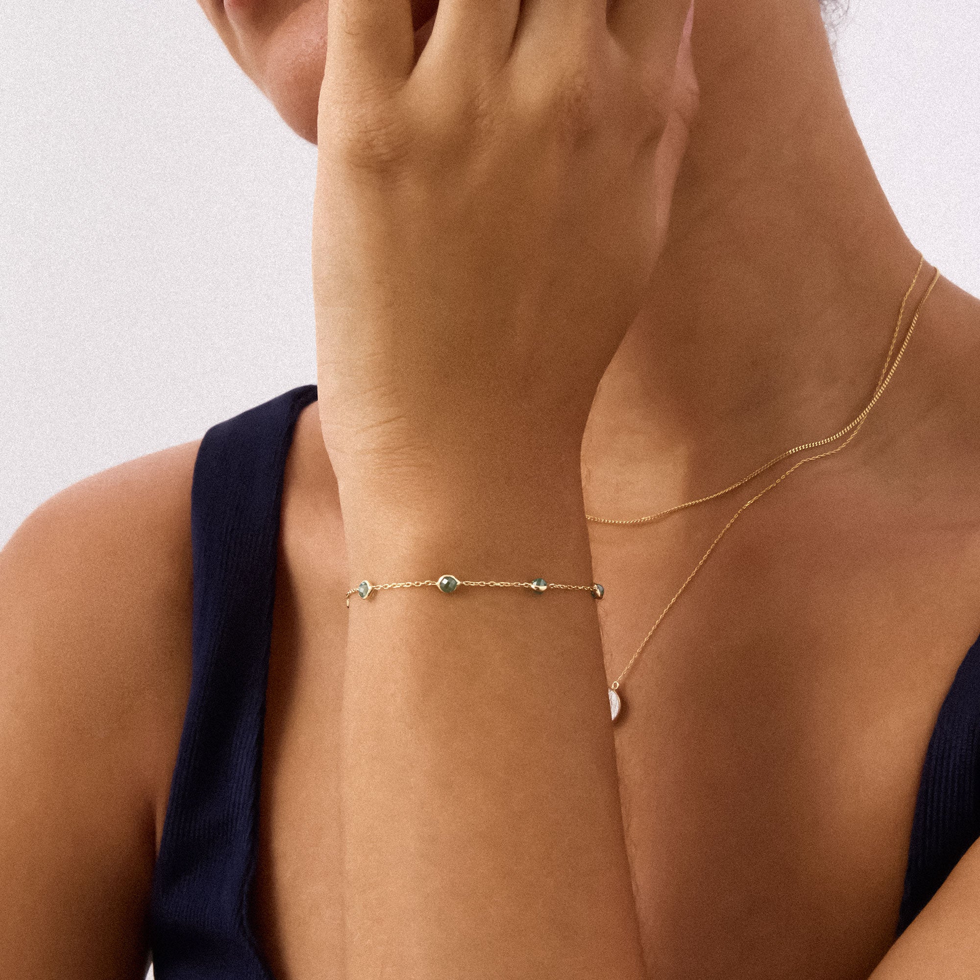 14K gold bracelet featuring beaded aquamarine stones, showcasing an elegant and timeless design, perfect for March birthstone jewelry and gifting occasions.