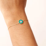 14K Real Solid Gold Bracelet with a turquoise enamel evil eye charm, representing protection and good luck, featuring an adjustable gold chain.