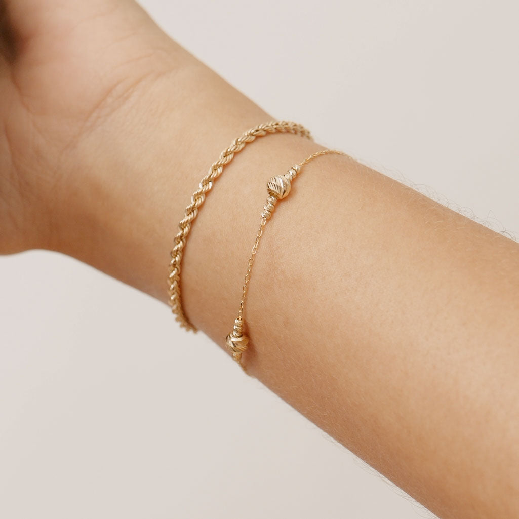 14K Real Solid Gold Bead Station Bracelet featuring dainty gold beads on a delicate gold chain, perfect as a stackable bracelet or thoughtful gift for women on occasions like Mother’s Day and Christmas.