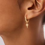 Elegant 14K Real Solid Gold North Star Earrings adorned with sparkling Cubic Zirconia Charms, perfect for adding a celestial touch to any ensemble.