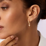 Elegant 14K Real Solid Gold North Star Earrings adorned with sparkling Cubic Zirconia Charms, perfect for adding a celestial touch to any ensemble.