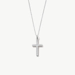 White gold cross necklace with diamonds on a white background