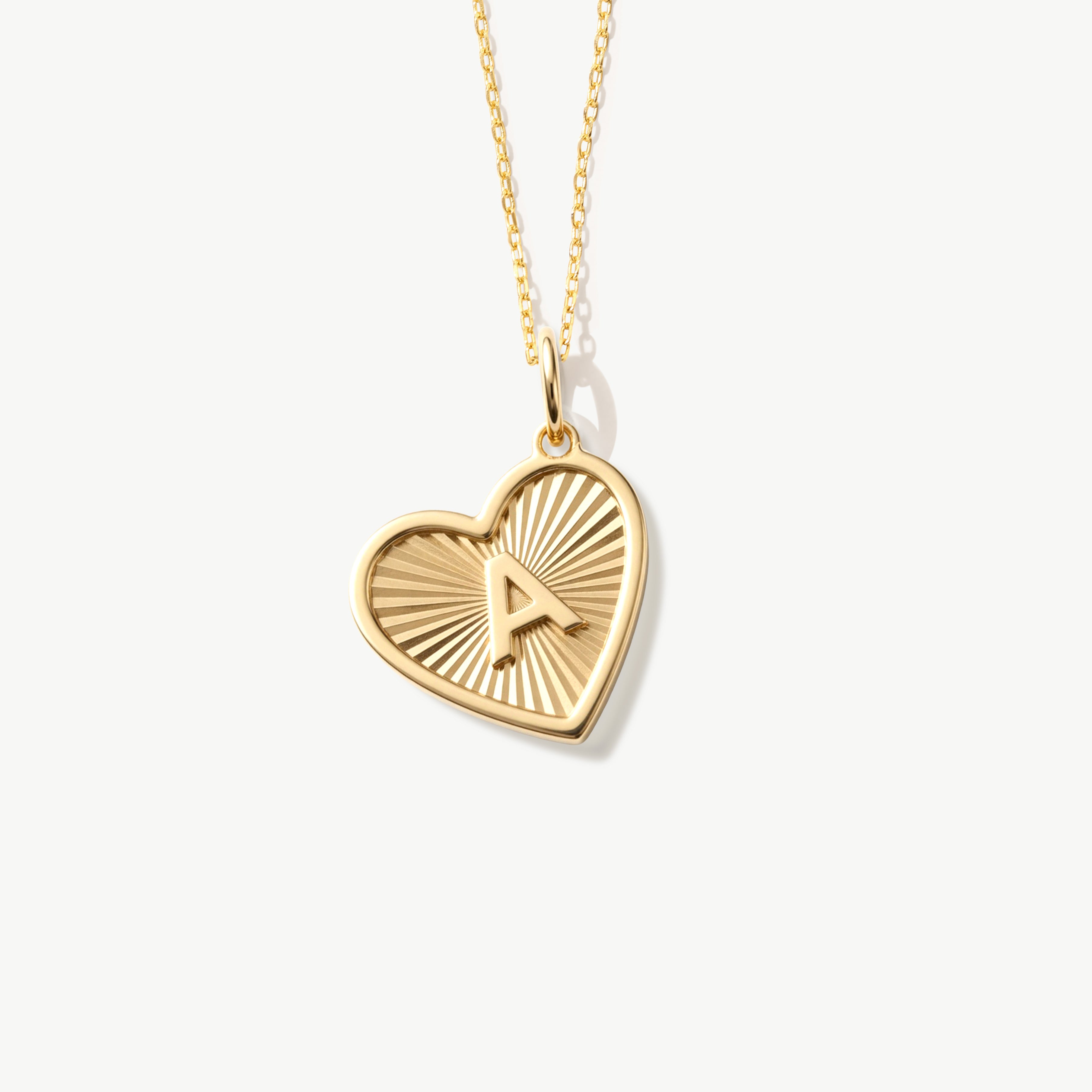 14K Solid Gold Personalized Heart Necklace with Sunburst Texture by Madano Jewels.