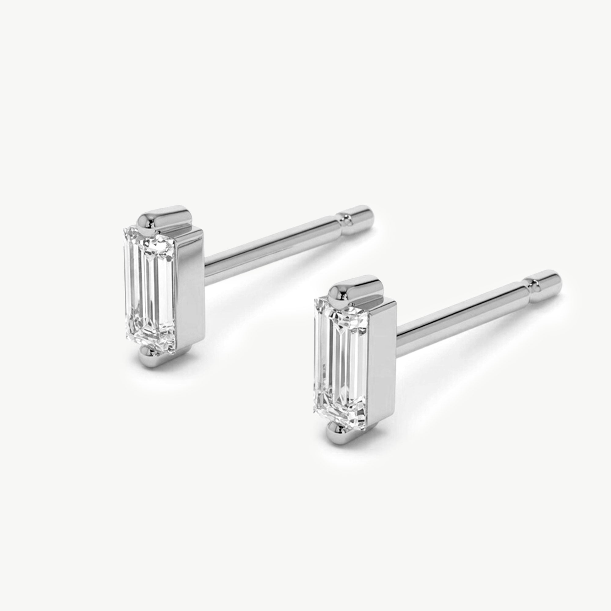 White Gold Baguette Diamond Stud Earrings In 14K Gold