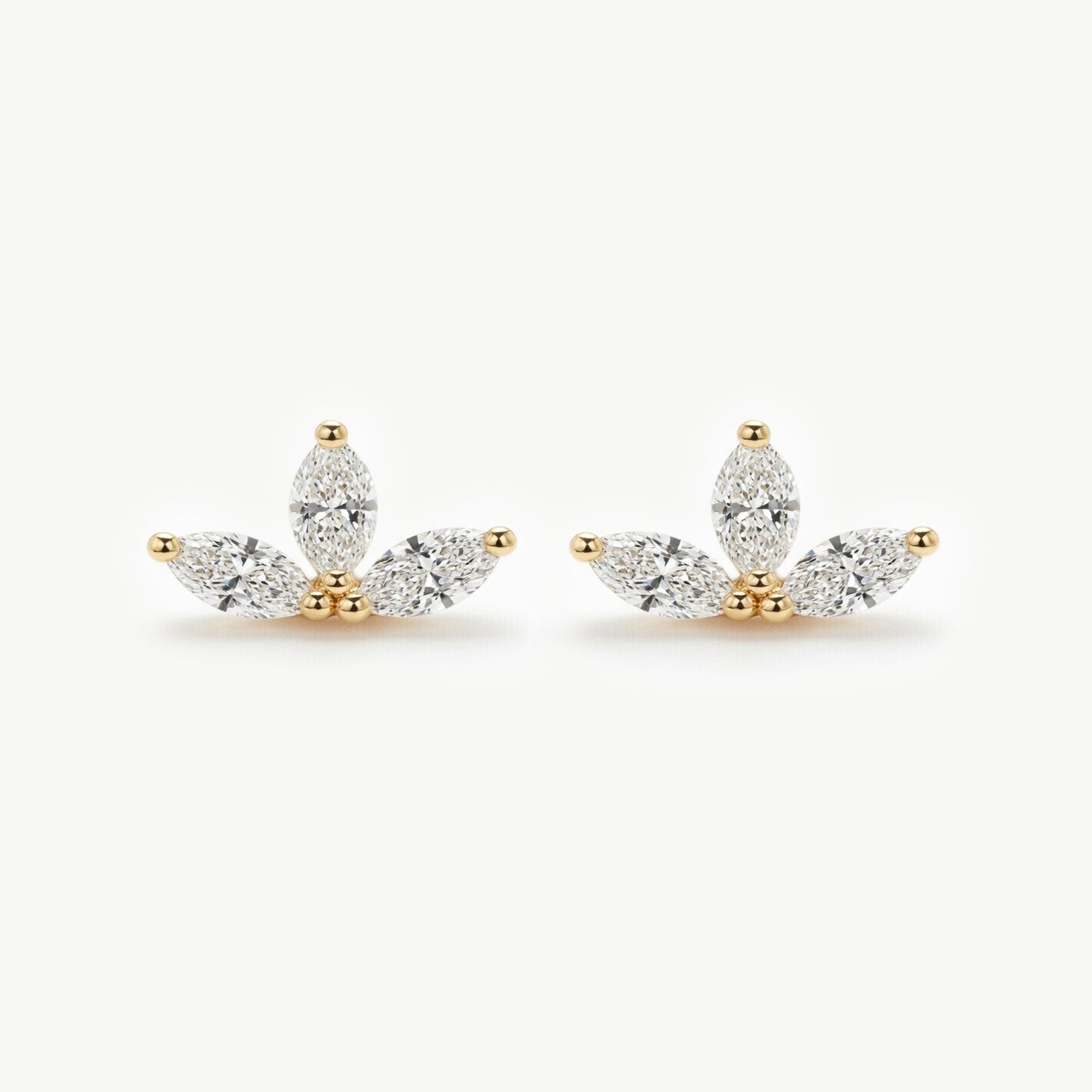 Front-facing view of marquise diamond flower stud earrings showing six lab grown diamonds arranged in a symmetrical lotus-inspired design.