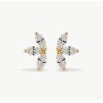 Pair of 14K solid gold floral diamond stud earrings displayed upright, highlighting the marquise diamond cluster arrangement.