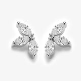 White gold version of marquise diamond lotus stud earrings featuring six lab grown marquise-cut diamonds in a floral cluster.