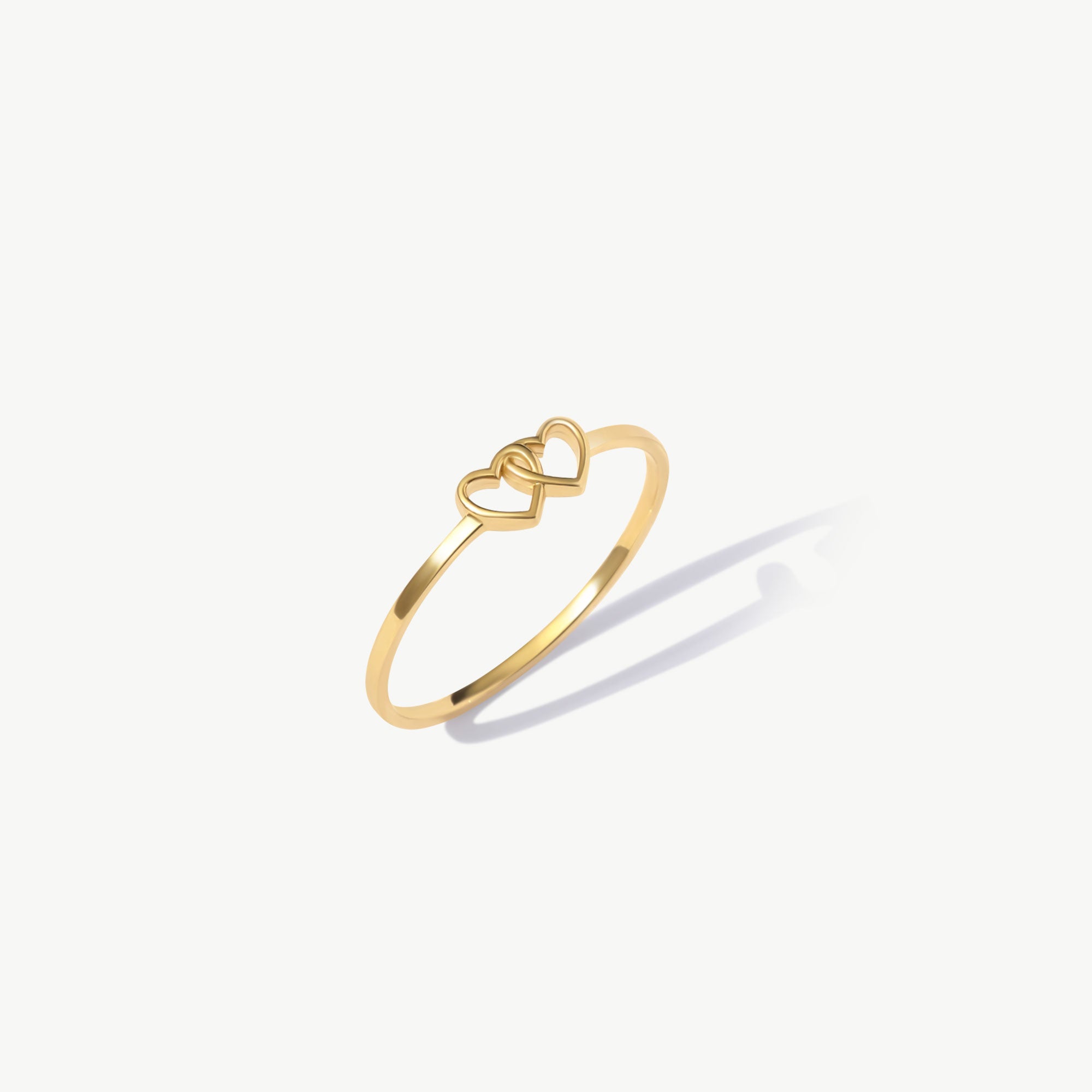 Minimal 14K Solid Gold Two Hearts Ring On White Background