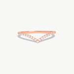 Product photograph of a rose gold diamond wishbone eternity band featuring natural pavé diamonds set in a delicate V shaped silhouette on a white background.