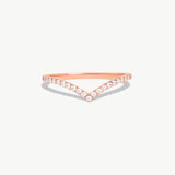 Product photograph of a rose gold diamond wishbone eternity band featuring natural pavé diamonds set in a delicate V shaped silhouette on a white background.