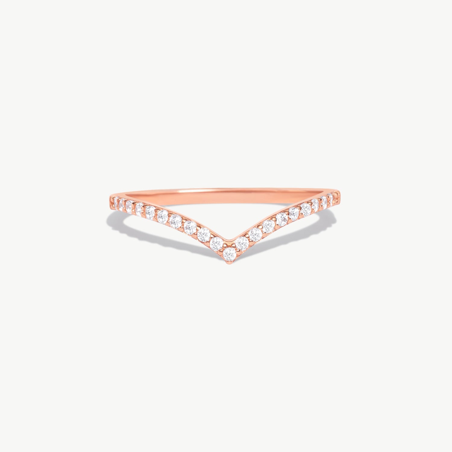 Product photograph of a rose gold diamond wishbone eternity band featuring natural pavé diamonds set in a delicate V shaped silhouette on a white background.