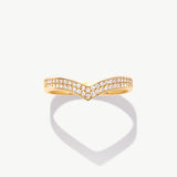 Yellow gold diamond wishbone eternity ring photographed front facing on a white background emphasizing the symmetrical V shaped pavé design.