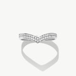 White gold diamond wishbone eternity ring photographed front facing on a white background highlighting the pavé diamond setting and V shaped silhouette.