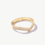 14K solid gold diamond wishbone eternity ring featuring 56 natural pavé set round diamonds arranged along a minimalist V shaped wedding band on a white background.