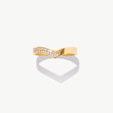 14K solid gold diamond half eternity wishbone ring featuring natural pavé set round diamonds arranged along a refined V shaped wedding band silhouette on a white background.