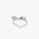 White gold half eternity wishbone ring featuring pavé set natural round diamonds arranged in a V shaped bridal band design.