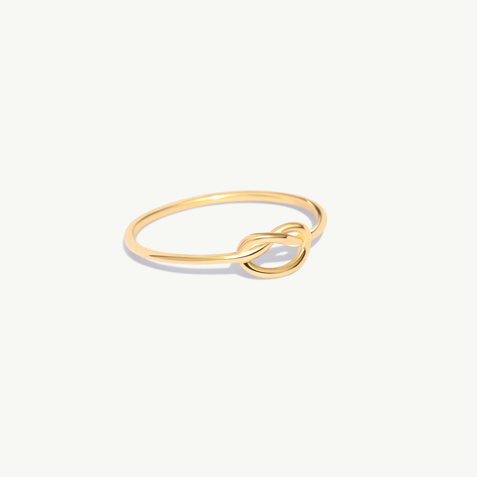 Woman Wearing Minimalist Knot Ring Everyday Jewelry Styling