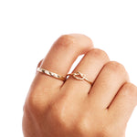 Woman Wearing Elegant Minimalist Knot Ring Fine Jewelry Style