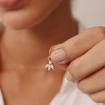 Luxurious 14K Real Solid Gold Hoop Earrings featuring sparkling Cubic Zirconia Charms, perfect for adding a sophisticated flair to any outfit.